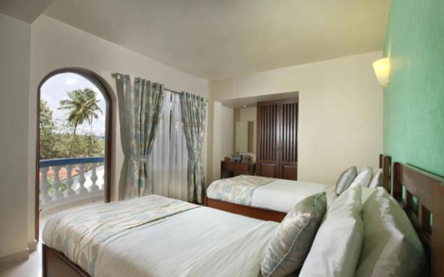 Monterio Hotel Baga Bagian luar foto